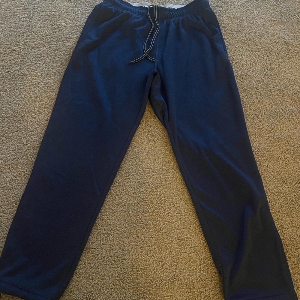 In good condition blue And1 joggers with cell phone pocket size large